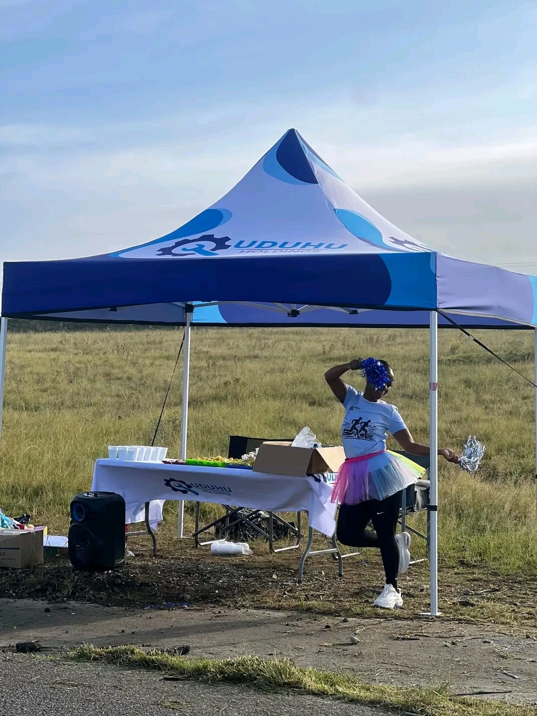 UDUHU Holdings branded hydration station at the 2026 Wellness Race